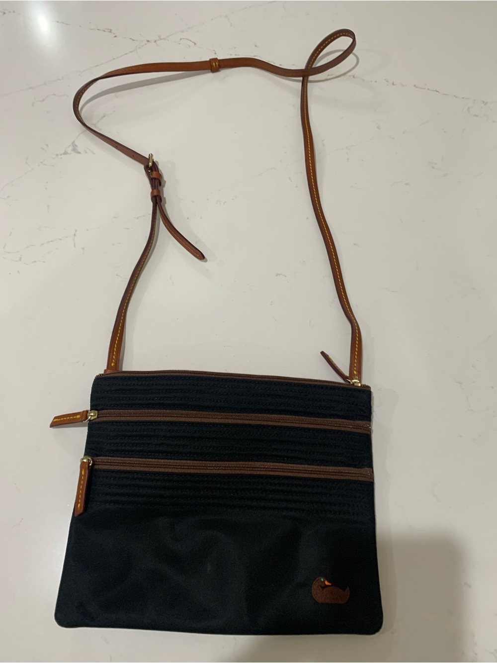 Dooney and Bourke Nylon North South Triple Zip cross body bag